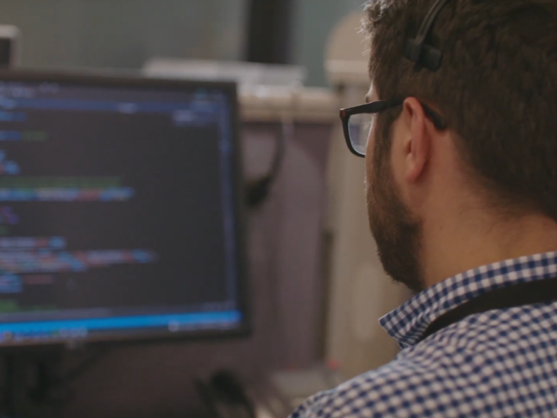 A KUBRA engineers works on a project in the company’s office